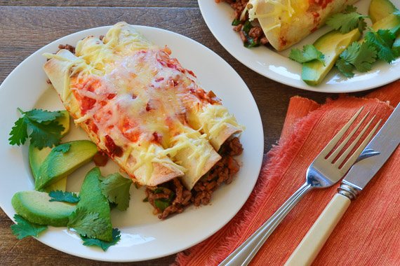 Cheesy Beef Enchiladas with Avocado, Spinach, and Beans