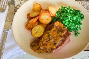 Pan-Seared Steaks with Creamed Spinach, Green Peppercorn Sauce & Roasted Baby Potatoes