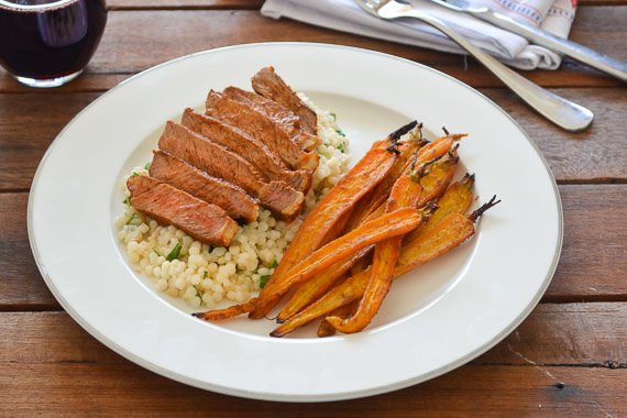 Thick-Cut Scotch Fillet with Roasted Baby Carrots & Minted Israeli Couscous