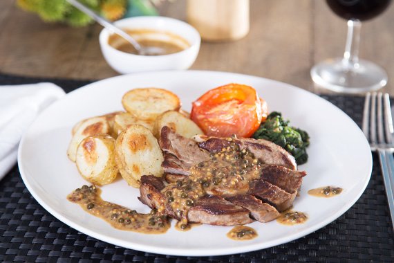 Pan-Seared Steak with Creamed Spinach, Green Peppercorn Sauce & Roasted Baby Potatoes