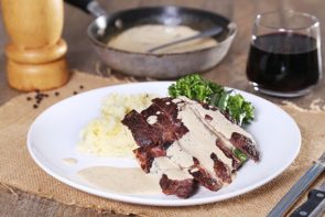 Steak with Creamy Pepper Sauce, Potato Mash & Greens
