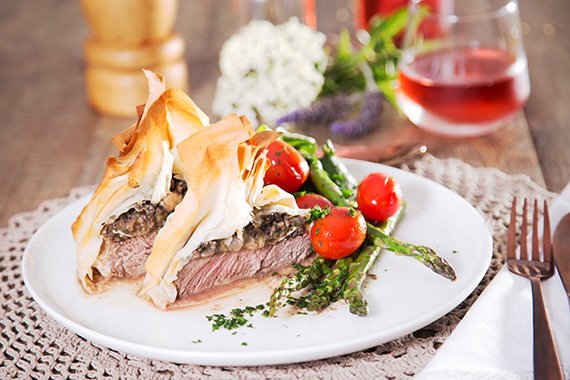 Beef Wellington with Brie & Mushroom, served with Asparagus, Cherry Tomatoes & Watercress Salad