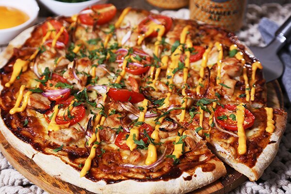 Chipotle Chicken BBQ Pizza with Cherry Tomatoes and Chipotle Drizzle