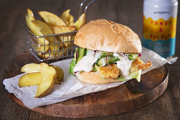 Crumbed Fish Burger with Cucumber Pickle, Potato Wedges & Tartare Sauce