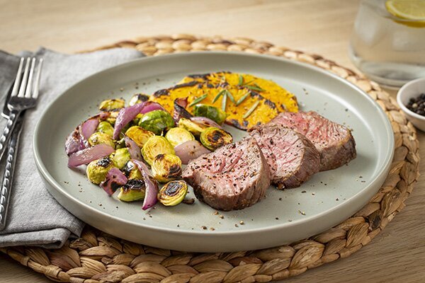 Garlic and Rosemary Mini Lamb Roast with Pumpkin, Red Onion and Brussels Sprouts