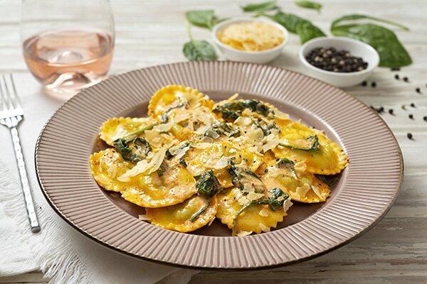 Spinach and Ricotta Ravioli in a Creamy Sundried Tomato Sauce