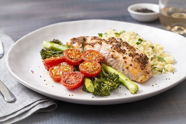 Baked Salmon with Honey Mustard Glaze Roasted Cherry Tomatoes, Broccolini and Couscous