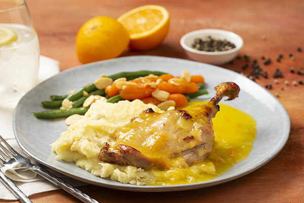 Duck A L'Orange with Mash Green Beans and Baby Carrots Almondine