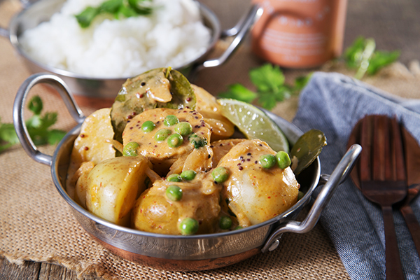 Potato and Pea Coconut Red Curry with Rice and Coriander