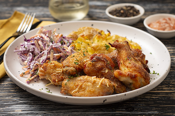 Garlic Parmesan Wings with Smashed Potatoes and Apple Coleslaw