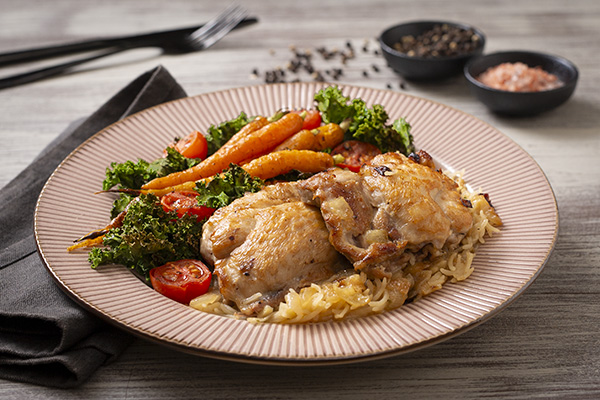 Garlic Butter Chicken and Rice Bake with Cherry Tomatoes, Baby Carrots and Kale