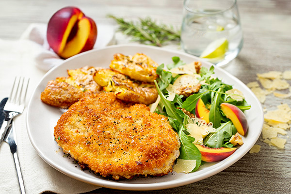 Chicken Milanese with Rosemary Smashed Potatoes and a Nectarine and Rocket Salad