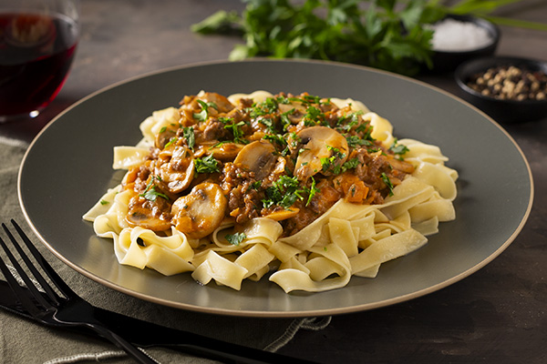 Creamy Beef Stroganoff with Curly Fettuccine, Mushrooms and Parsley