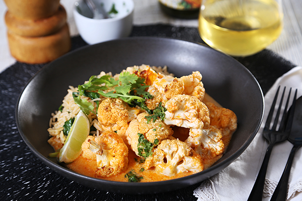 Oven Baked Tandoori Cauliflower with Garlic Infused Spinach Rice and Coriander Lime Sauce