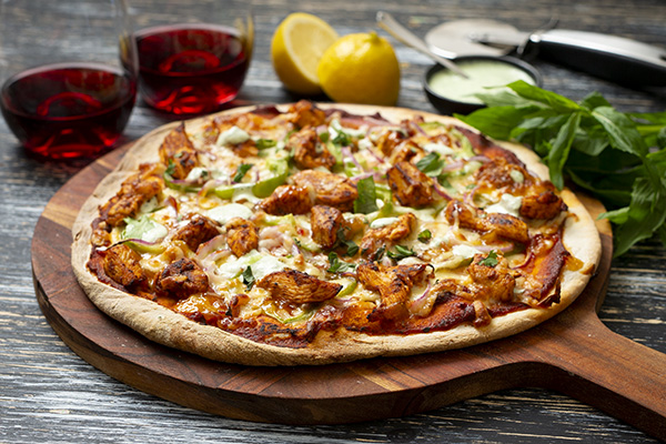 Chicken Tikka Pizza with Herb Yoghurt and Mango Chutney