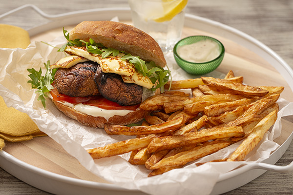 Portobello Mushroom and Haloumi Burger with a Garlic Turkish Bun and Wedges.